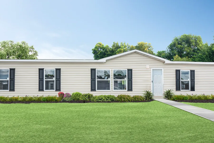 Sprinter manufactured home exterior in cream with black shutters
